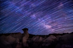 Starry Streaks Across the Milky Way star trail photo of Paint Mines Colorado by Dan Bourque