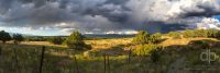 The Fence and the Storm landscape photo by Dan Bourque